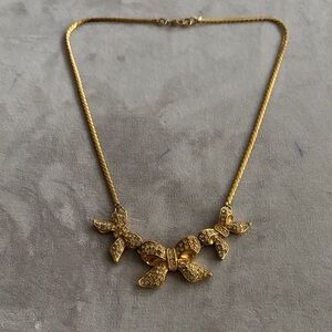 Monet Gold Bow Necklace with Sparkling Accents